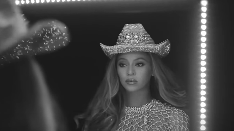 Beyoncé says her motivation for dipping into the country music genre goes beyond sales figures and chart numbers. She is driven by breaking barriers.